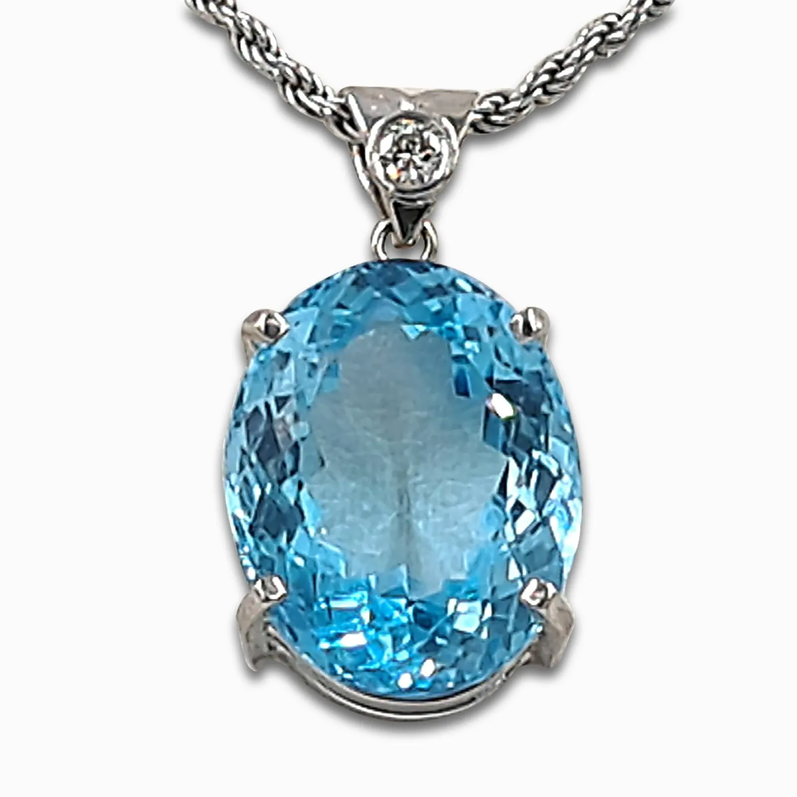 Blue Topaz white gold pendant with diamond